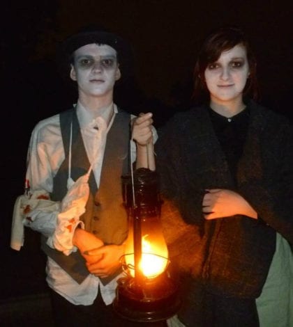 hauntings-boy-and-girl-with-lantern