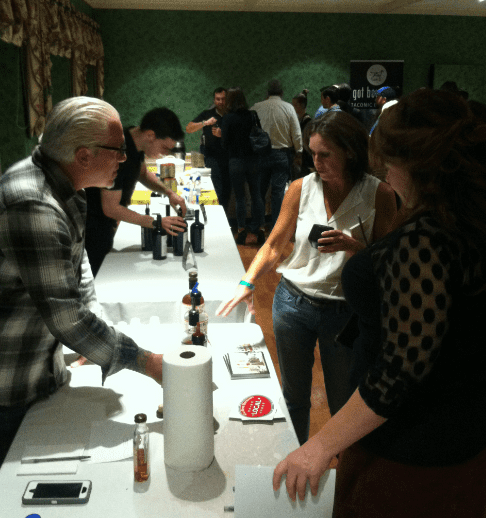Guest at the WEHA Whiskey Festival at Hartford Golf Club enjoy samples of 200 different kinds of whiskey. Photo credit: Tom Hickey