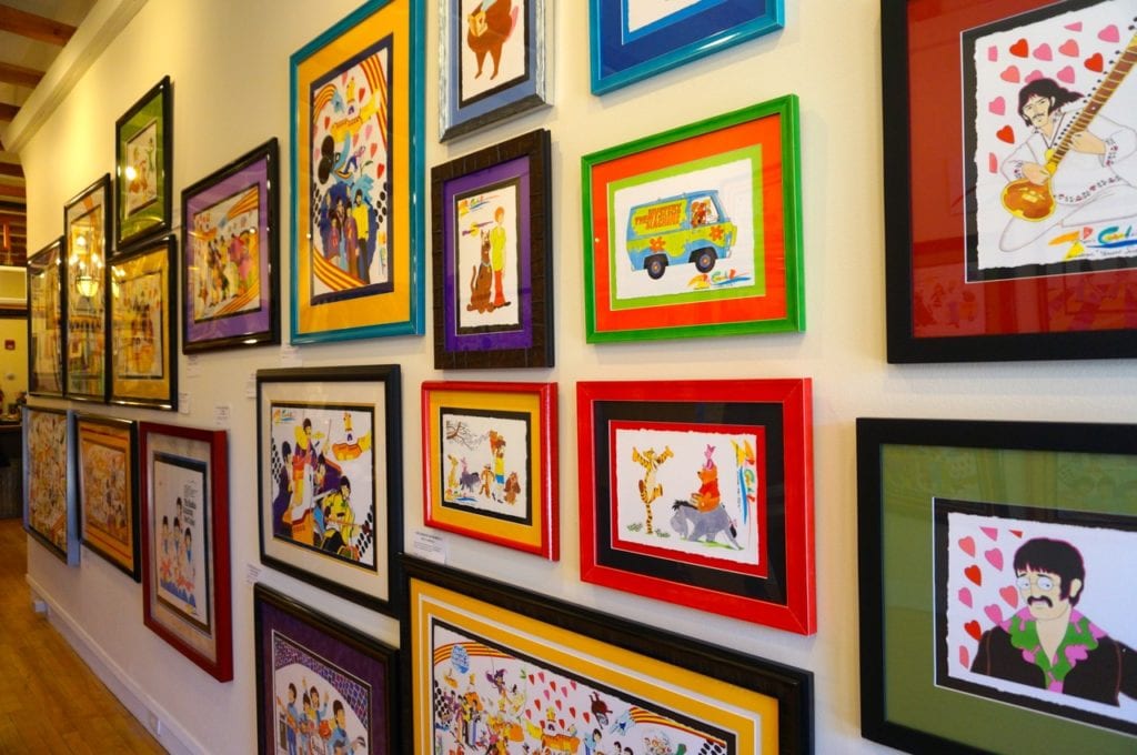 Ron Campbell work on display at Center Framing & Art. Photo credit: Ronni Newton