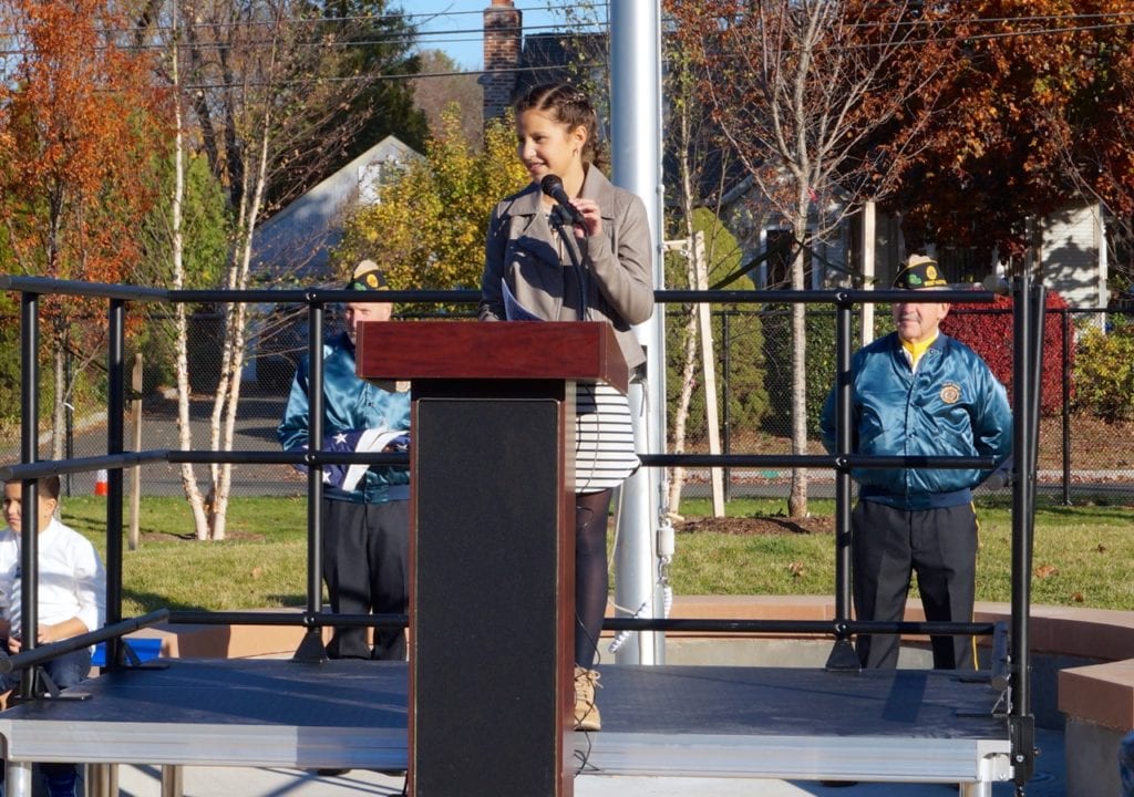 Fifth grader Marianna Temponi served as emcee at Charter Oak's ceremony. Veterans Day 2016. Photo credit: Ronni Newton