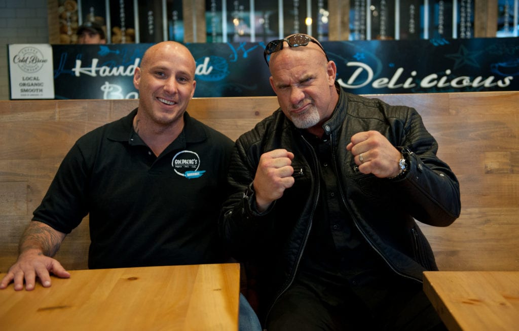 'Goldberg' (right) with Goldberg's Gourmet co-owner Chad Kirby in Blue Back Square in West Hartford. Photo credit: Cheyney Barrieau