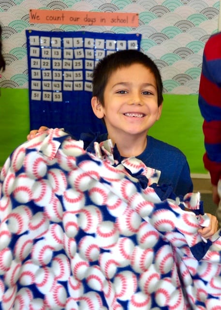 Renbrook first graders make blankets for Connecticut Children's Medical Center patients. Submitted photo