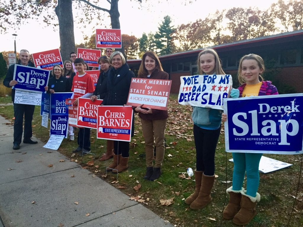 Candidate Derek Slap and family and supporters of many other candidates outside Braeburn Elementary School Tuesday afternoon. Photo credit: Ronni Newton
