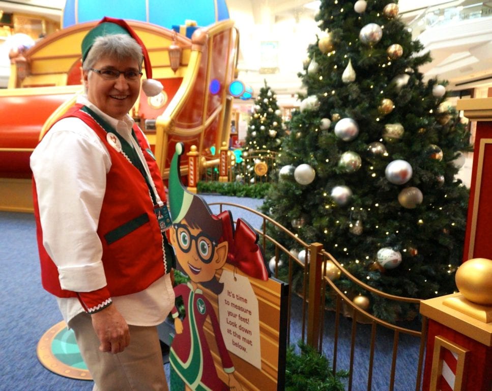 Elf Tooch is one of Santa's helpers who guides children through Santa's Flight Academy. Photo credit: Ronni Newton