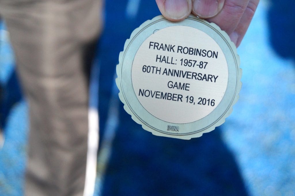 Frank Robinson side of commemorative coin used in coin flip. Annual Conard vs. Hall West Hartford Mayor’s Cup football game. Nov. 19, 2016. Photo credit: Ronni Newton