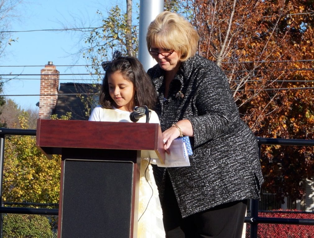 Organizer Janet Fournier with a student who speaks about bravery. Veterans Day 2016. Photo credit: Ronni Newton