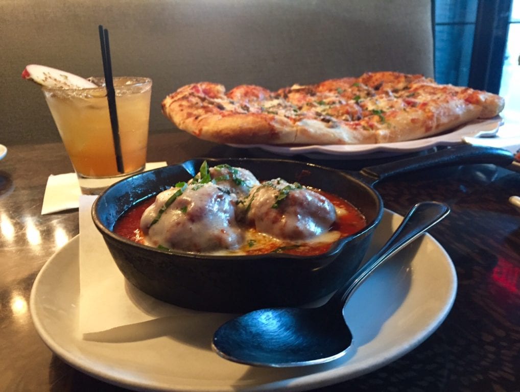 Meatballs al forno is a staple of the happy hour menu at Rizzuto's. Photo credit: Ronni Newton