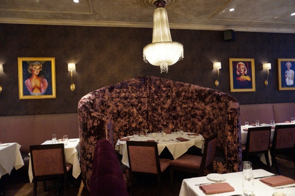 A focal point of the Noble & Co. dining area is this large plush booth. Photo credit: Ronni Newton
