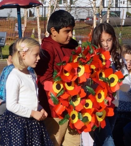 ruby-hughes-arnav-kandel-and-arycelli-ruffasto-place-wreath