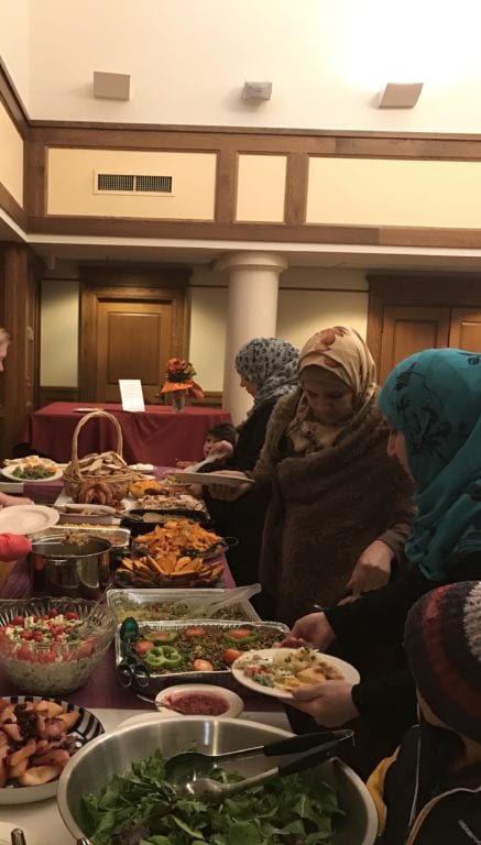 Thanksgiving dinner for refugees at St. John's Episcopal Church, West Hartford. Photo courtesy of Rector Susan Pinkerton
