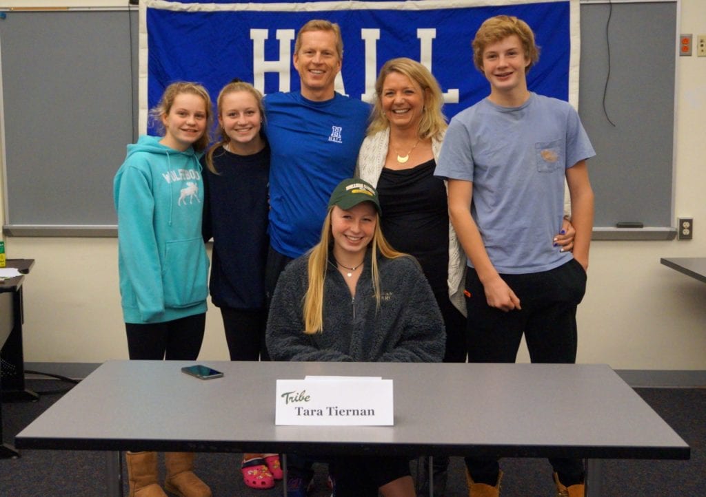 Tara Tiernan (seated) with her parents and siblings at her Letter of Intent signing on Nov. 17, 2016. From left: Meghan, Kelly, JT, Karen, and Kevin. Photo credit: Ronni Newton