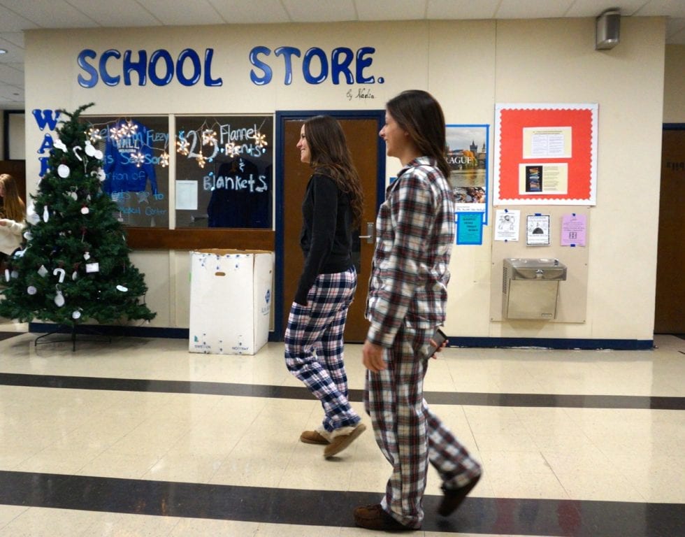 Hall students in pjs walk to class. Photo credit: Ronni Newton