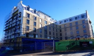 Construction is in full swing on the Delamar West Hartford Hotel (note work taking place on Sunday afternoon) with a planned opening in late spring 2017. Photo credit: Ronni Newton