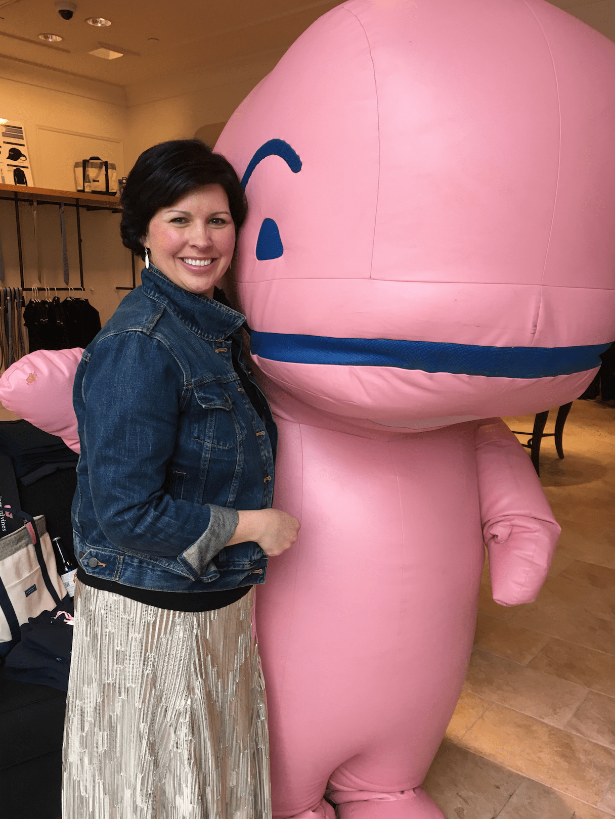 Director of Marketing & Communications at Bridge Family Center Amanda Aronson with the Vineyard Vines Whale Mascot at the We-Ha Pop-Up Store in Blue Back Square. Photo credit: Joy Taylor
