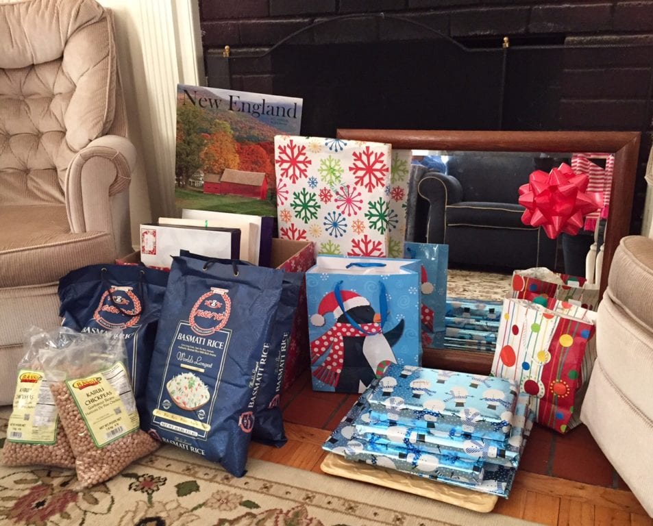 The Kattoub family's gifts are arranged in front of the fireplace in the family's West Hartford apartment. Photo credit: Ronni Newton