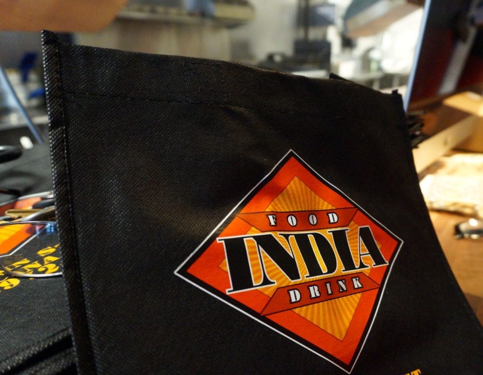 INDIA Restaurant & Bar reusable takeout bags. Photo credit: Ronni Newton
