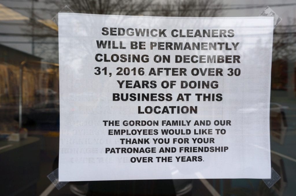 Dana Gordon taped this sign to the door of Sedgwick Cleaners on Wednesday. Photo credit: Ronni Newton