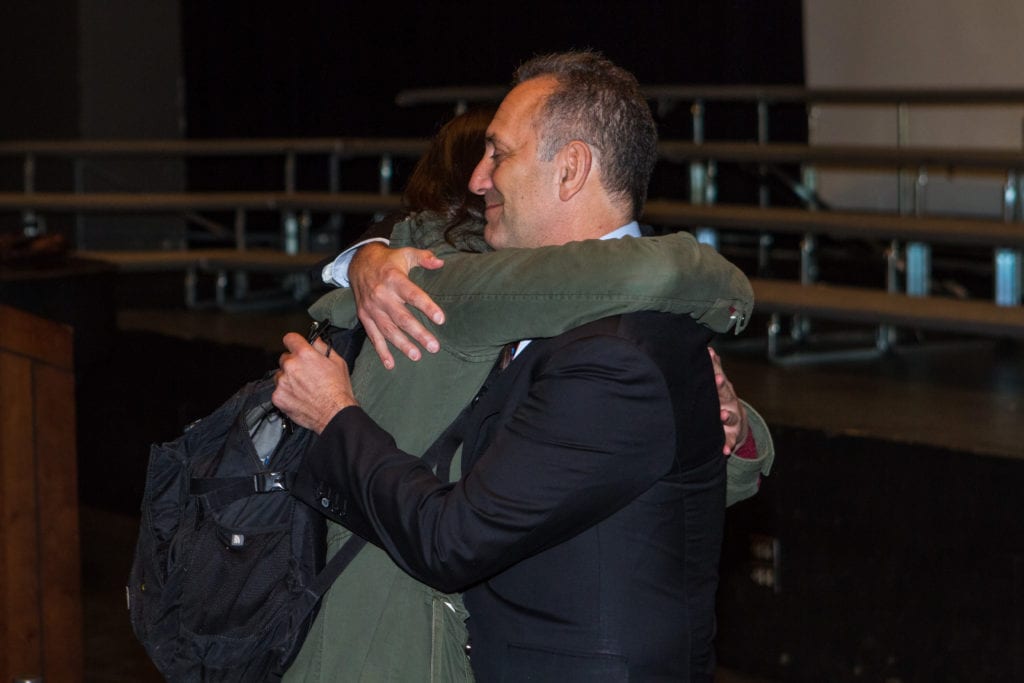 An unidentified KO student hugs Gary Mendell of Shatterproof after a riveting assembly on Jan. 6. Photo credit: David Newman