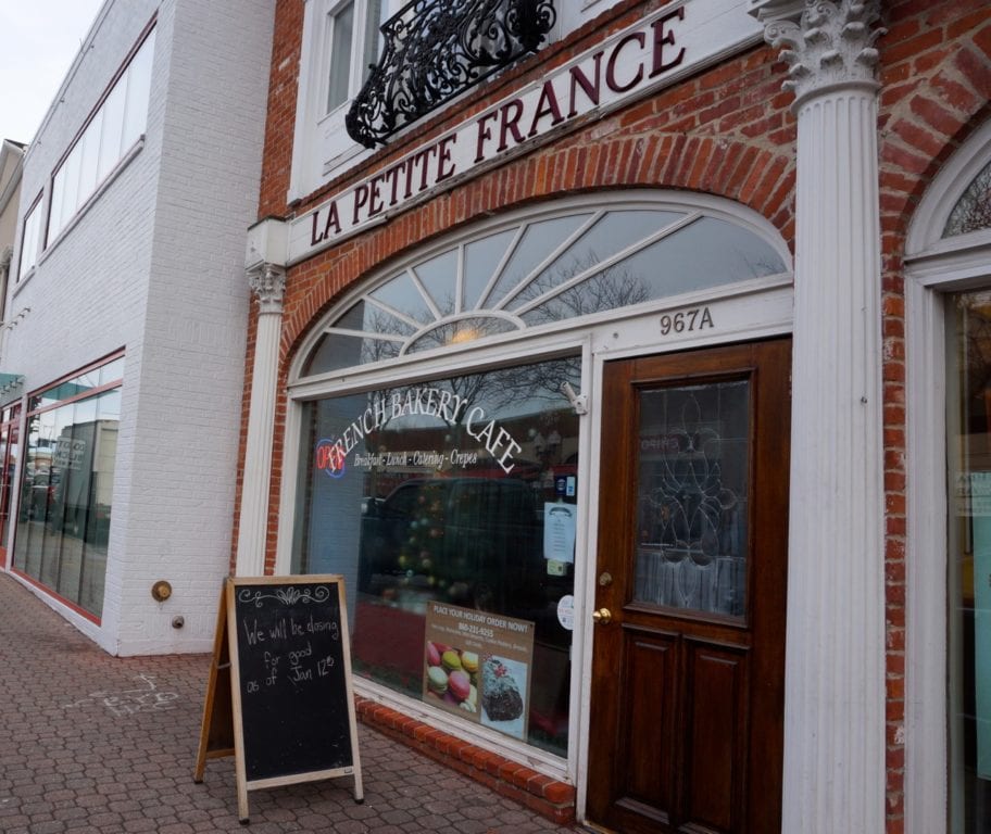 A sign posted in front of La Petite France at 967 Farmington Ave., West Hartford, indicates that the business will close on Jan. 12, 2017. Photo credit: Ronni Newton