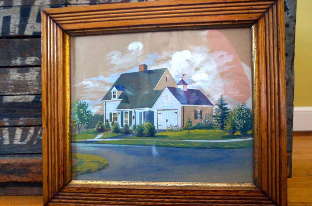 The original owner left this oil painting of the home. Photo credit: Ronni Newton