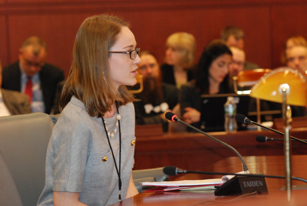 Legislative Intern Jennifer Martin reads testimony written by State Sen. Beth Bye. Submitted photo