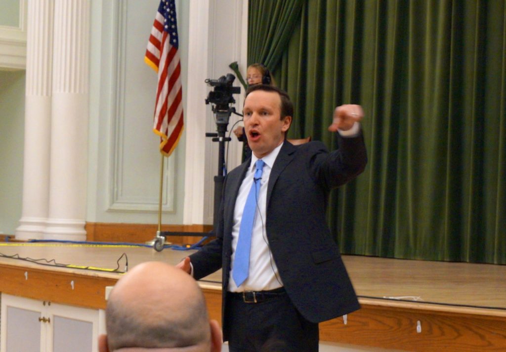 U.S. Sen. Chris Murphy responds to questions from the audience at a Town Hall meeting in West Hartford Tuesday night. Photo credit: Ronni Newton