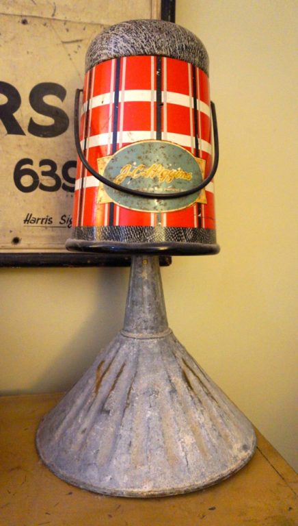 A thermos atop a funnel is one of Jim Healy's unique hand-crafted lamps. Photo credit: Ronni Newton