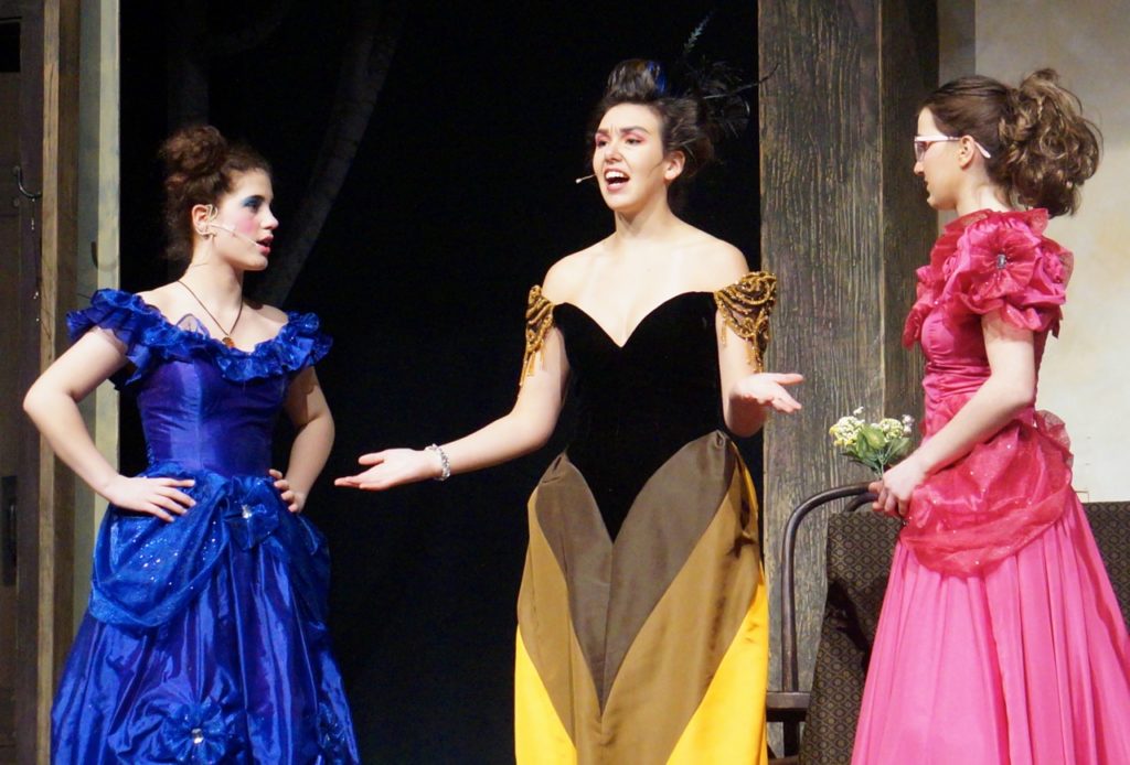The wicked stepmother (center) with her 'daughters that matter' Charlotte (left) and Gabrielle. Conard High School Musical Productions presents ‘Cinderella.’ Photo credit: Ronni Newton