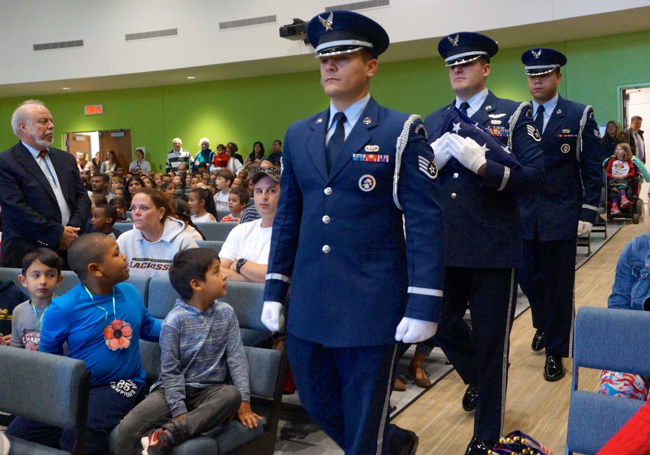 103rd airlift honor guard enters auditorium
