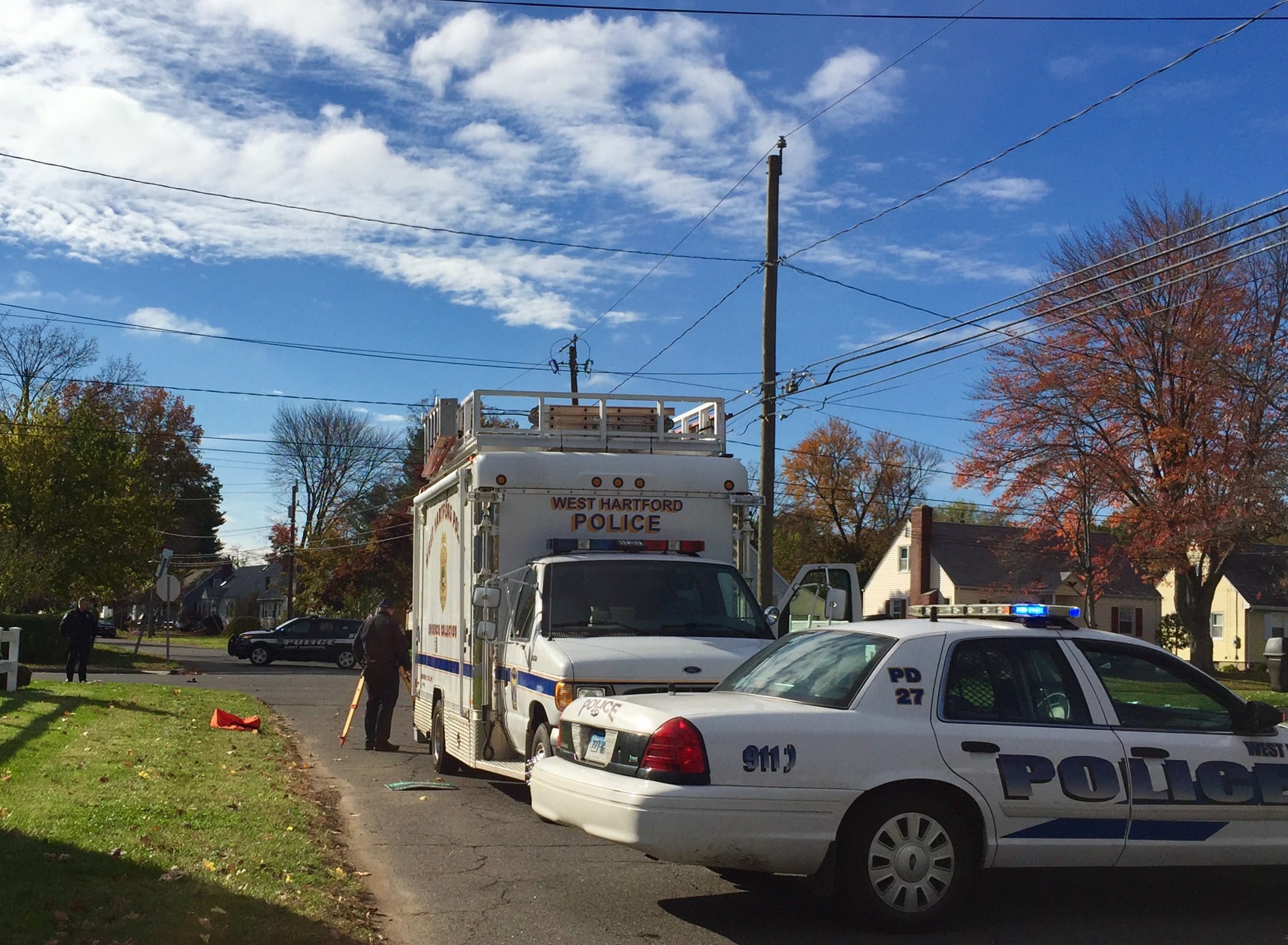 police on scene of car vs bicycle crash