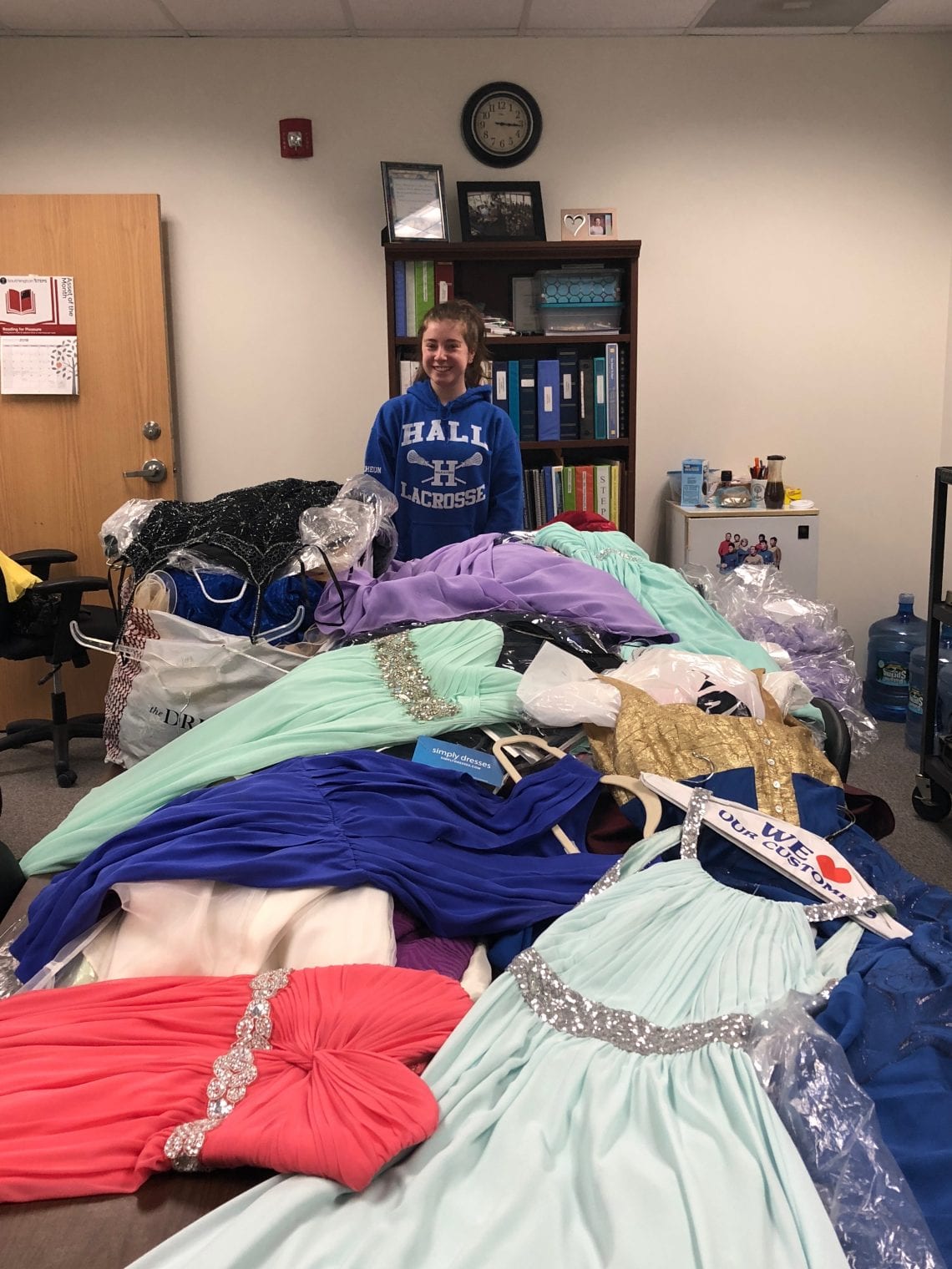 Hall High School Junior Collects Dozens of Prom Dresses for Donation
