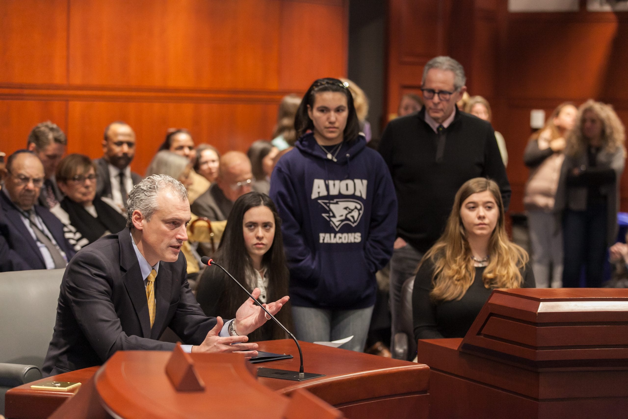 State Rep. Derek Slap testifies with Avon High School students