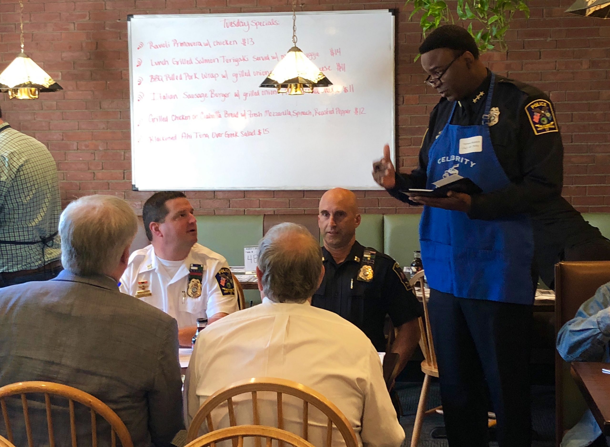 police chief serving breakfast