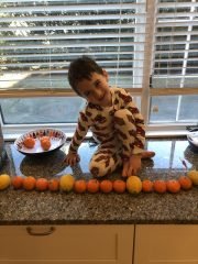 A Soloman Schechter student completing a math exercise from home