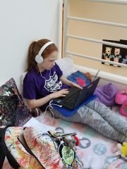 A Soloman Schechter student engaging in online learning