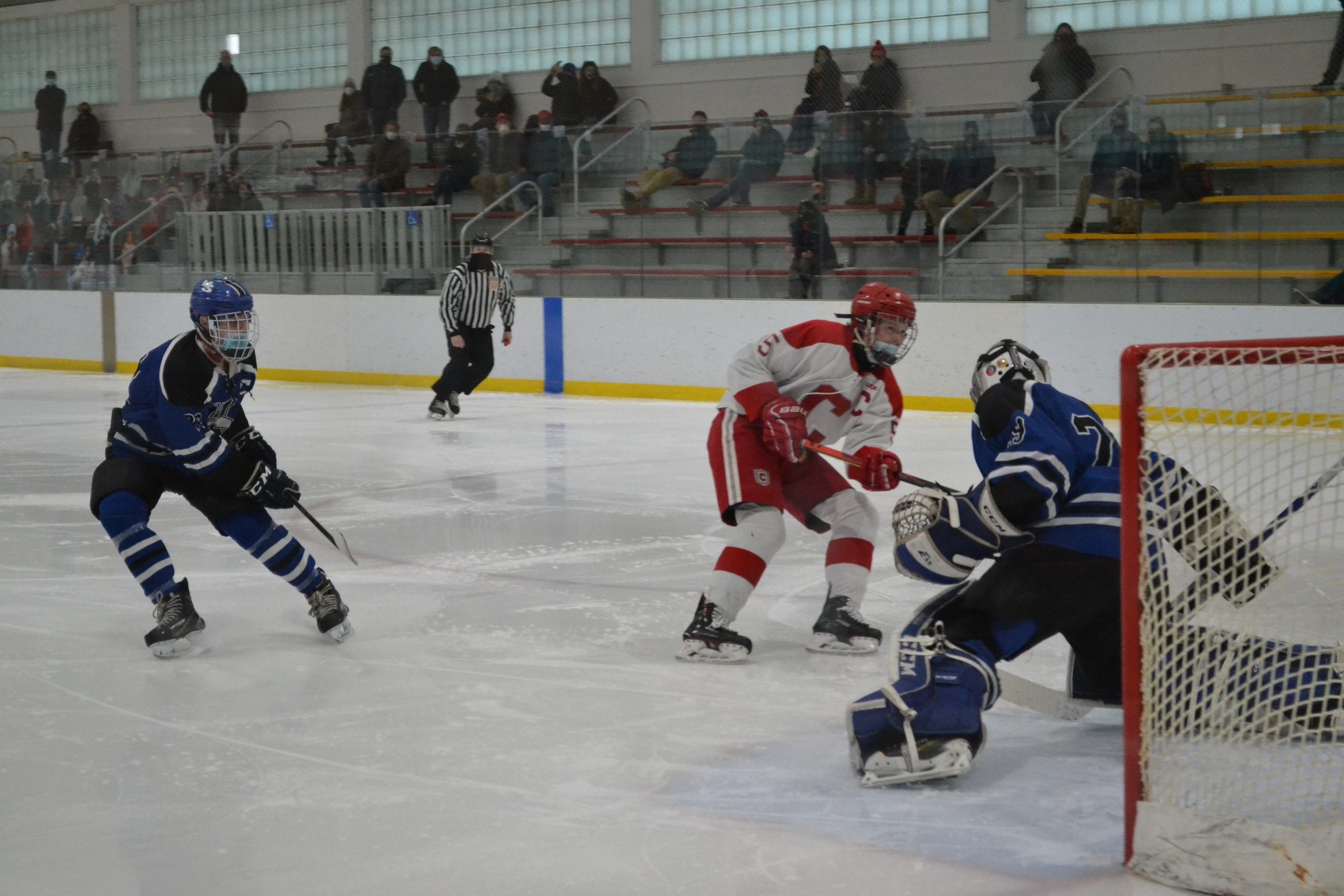 Hall goalie Noah Behrens-Gould (#29) makes the save against Conard’s Owen McGoldrick (#5) – Copy