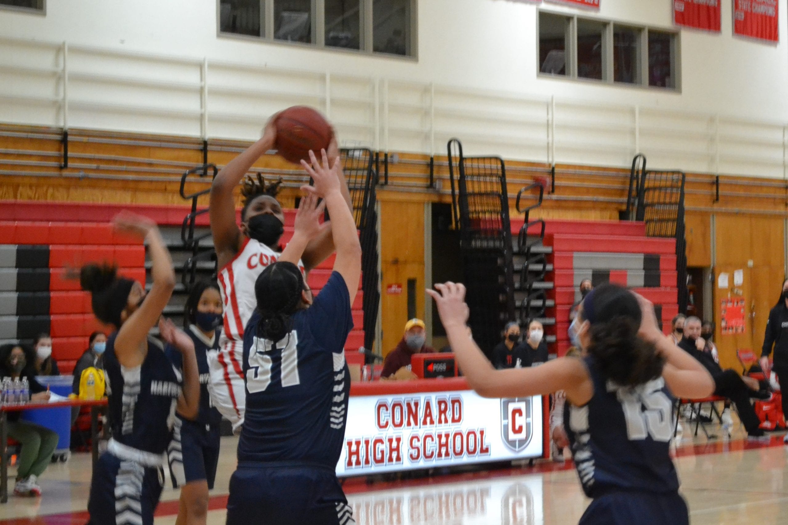 Conard’s Azaiyah Felder Goes Over Hartford Public’s Mari Figueroa On The Way To A 29-Point Game Monday