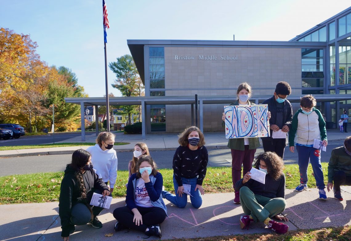 Bristow Middle School Students Bring Smiles to Veterans with Gift of Flag WeHa West