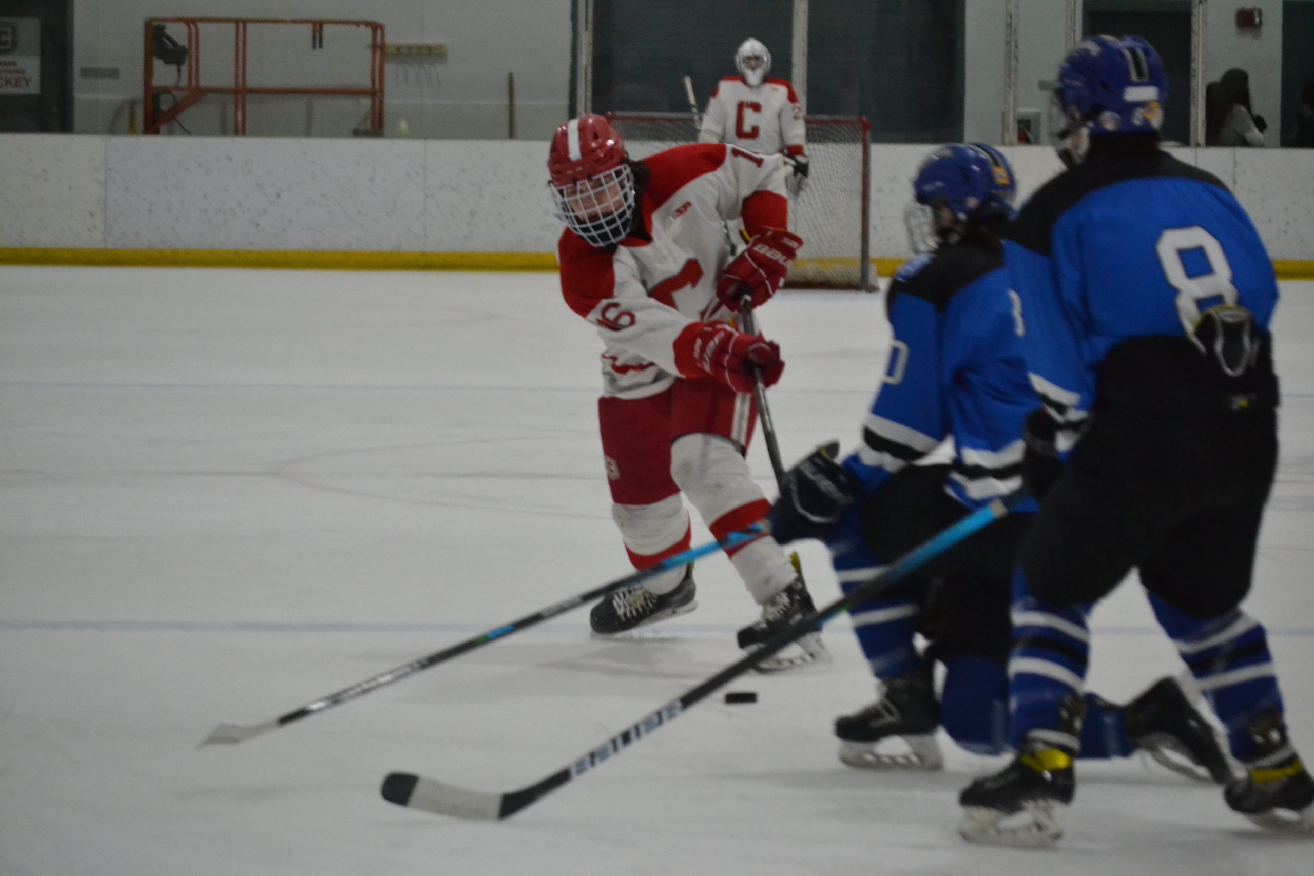 Holden Patrissi Of Conard Tries To Shoot Past Two Hall Defenders