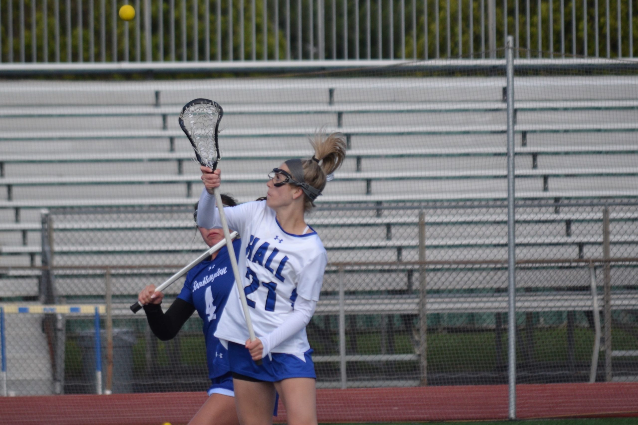 Emma Keller (22) Of Hall Battles With Southington's Taylor Foresi For A ...