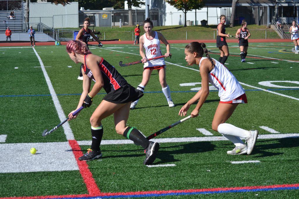 Gracelyn WIlliams of Conard Covers The Cheshire Player While Teammate Sophia Bavaro Supports