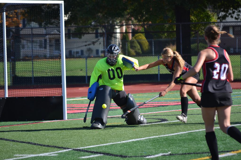 Lilly Grose Makes The Kick Save WIth A Cheshire Attacker Closing In