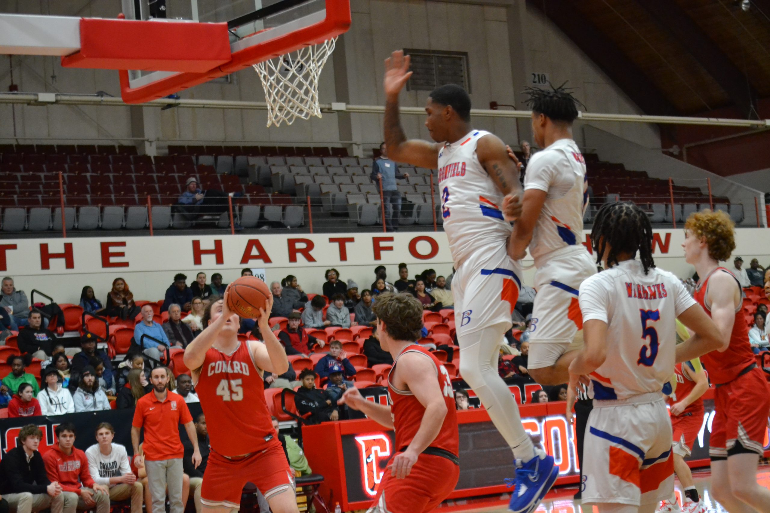 Ryan Bushnell setsup for the hoop for Conard