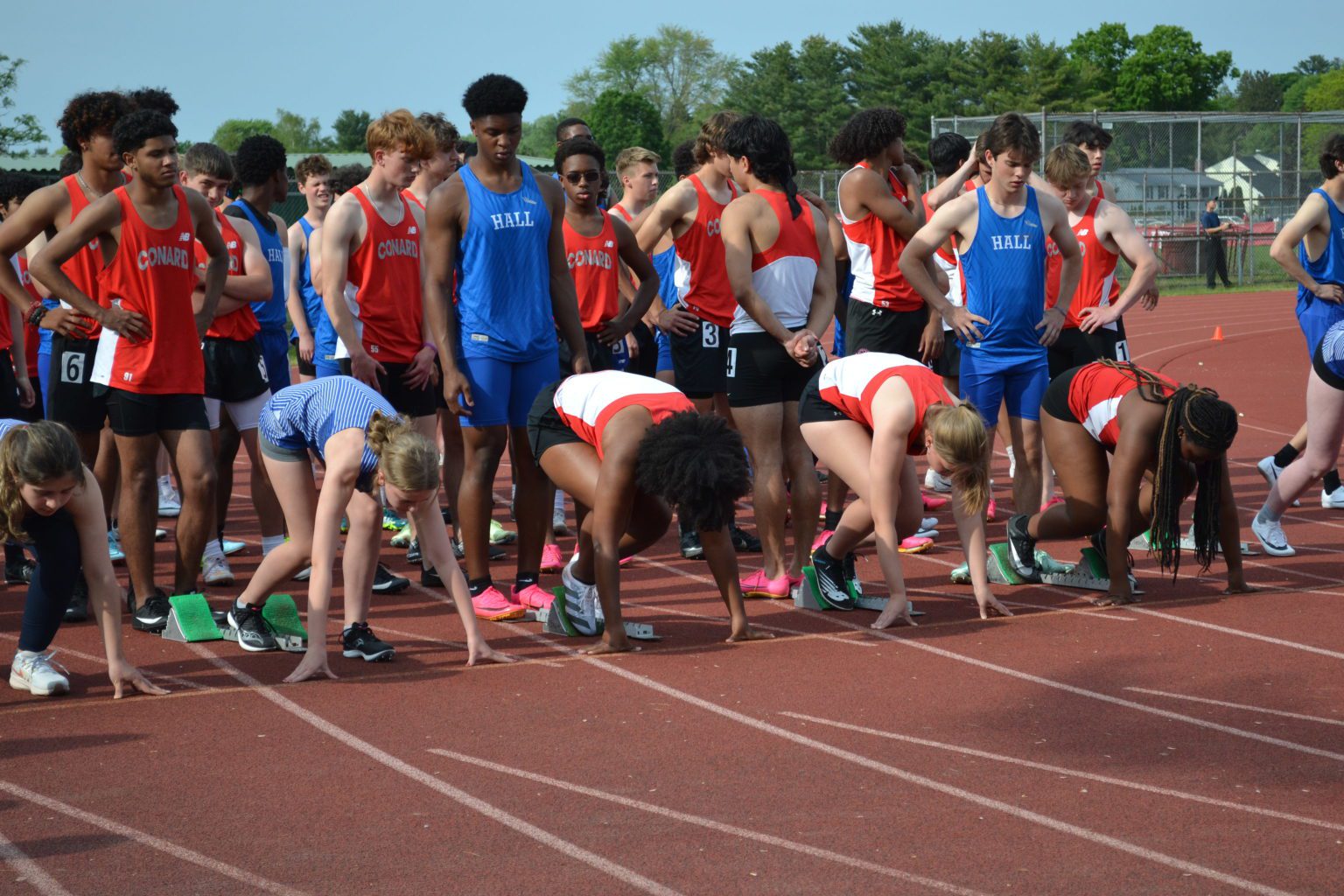 Crosstown Rivalry Leads to Great Performances for Hall and Conard Track and Field WeHa West