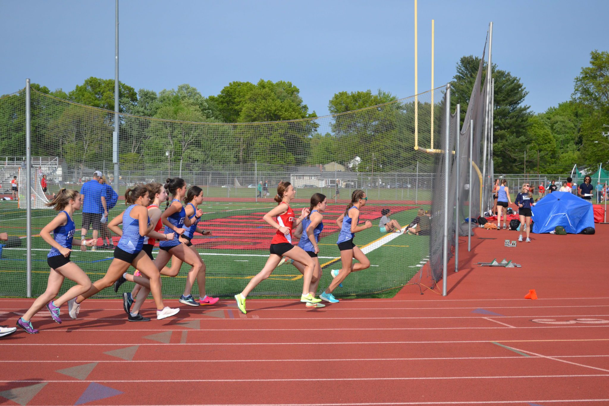 Crosstown Rivalry Leads to Great Performances for Hall and Conard Track and Field WeHa West