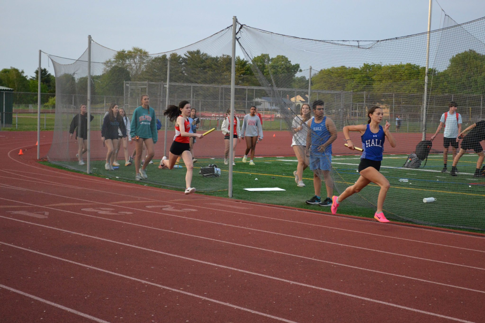 Crosstown Rivalry Leads to Great Performances for Hall and Conard Track and Field WeHa West