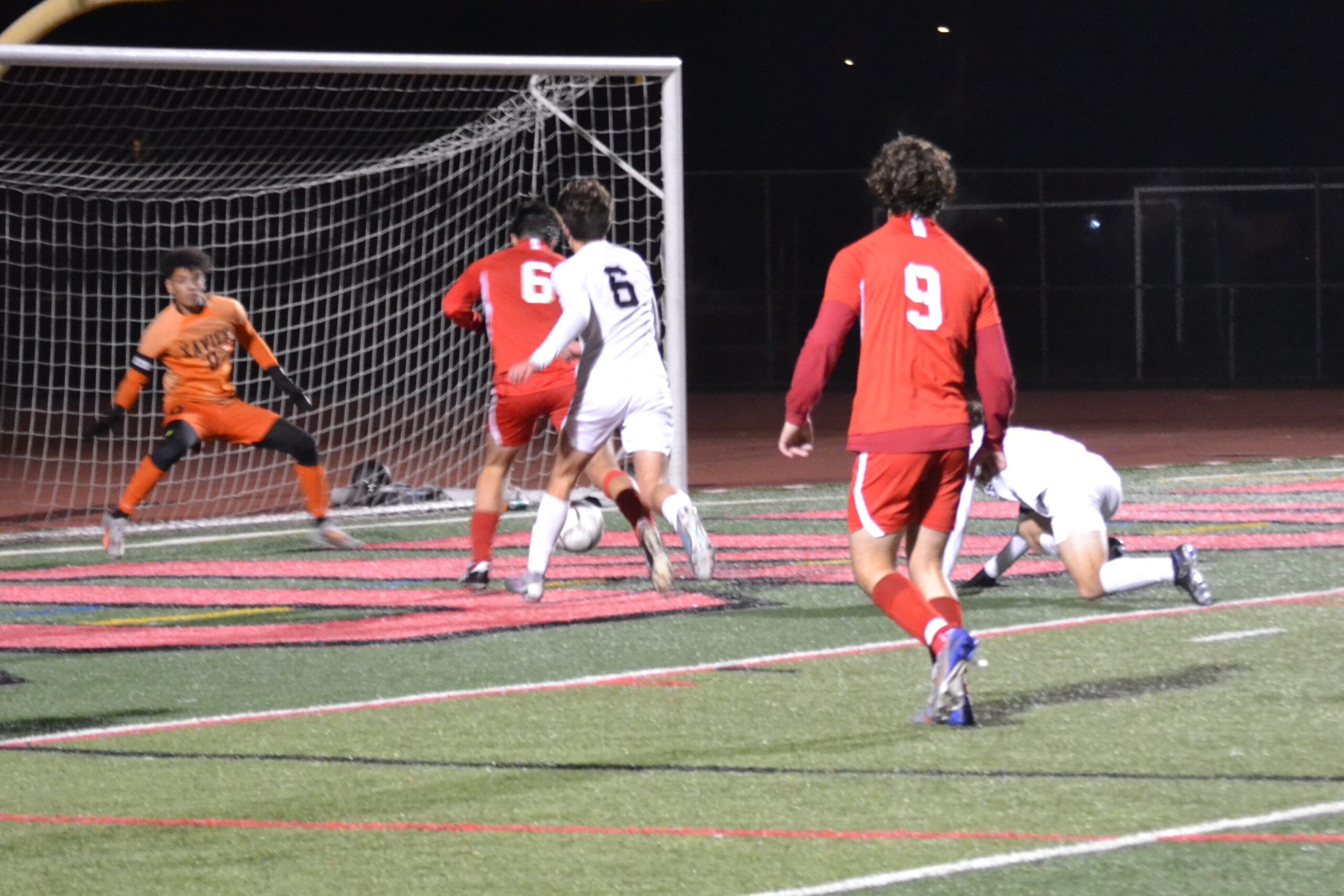 Jules Capone (6) of Conard gets to the loose ball and scores Coanrd’s lone goal of the game