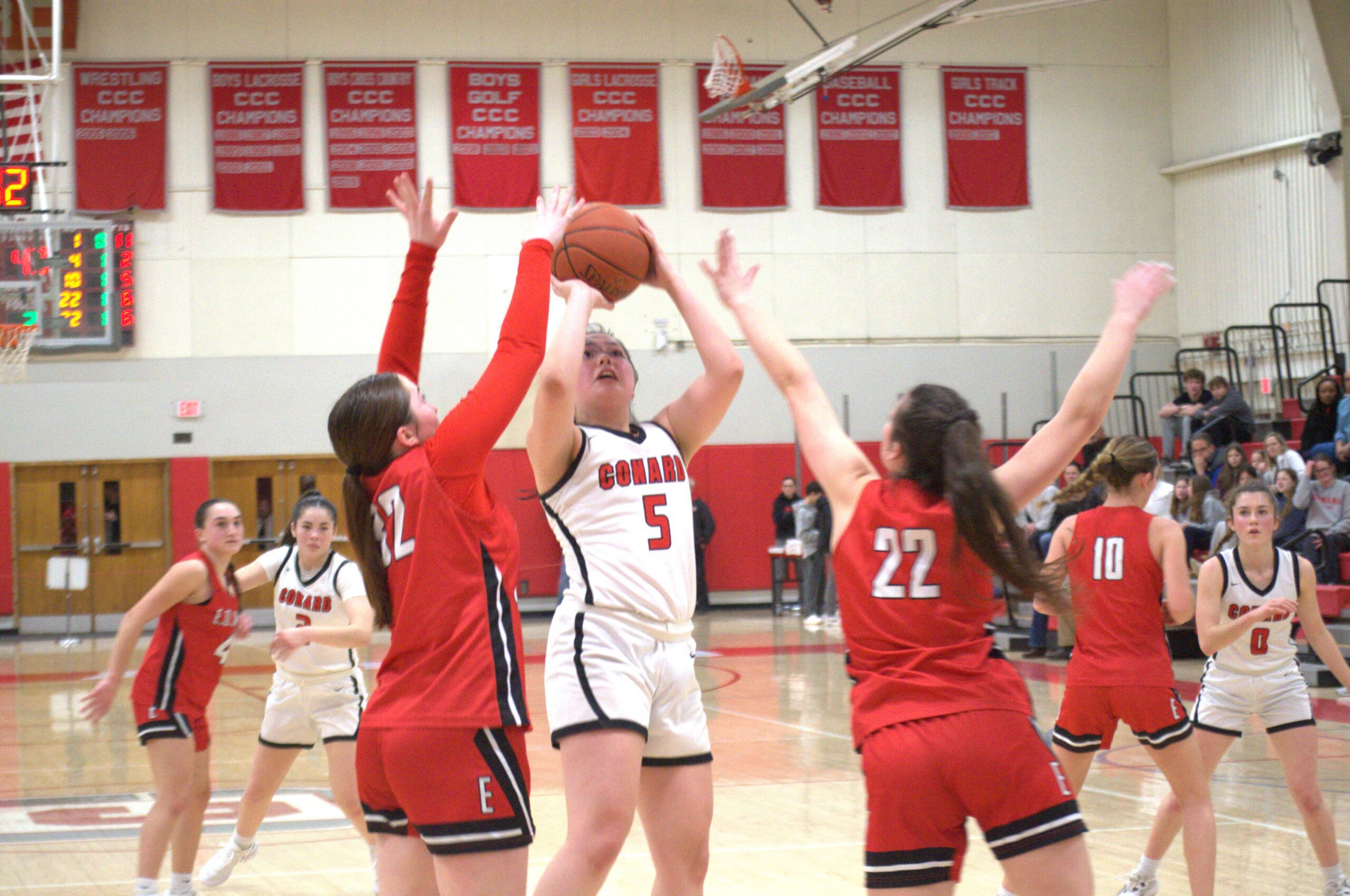Senior Kathryn Torla hits for two in the lane for Conard