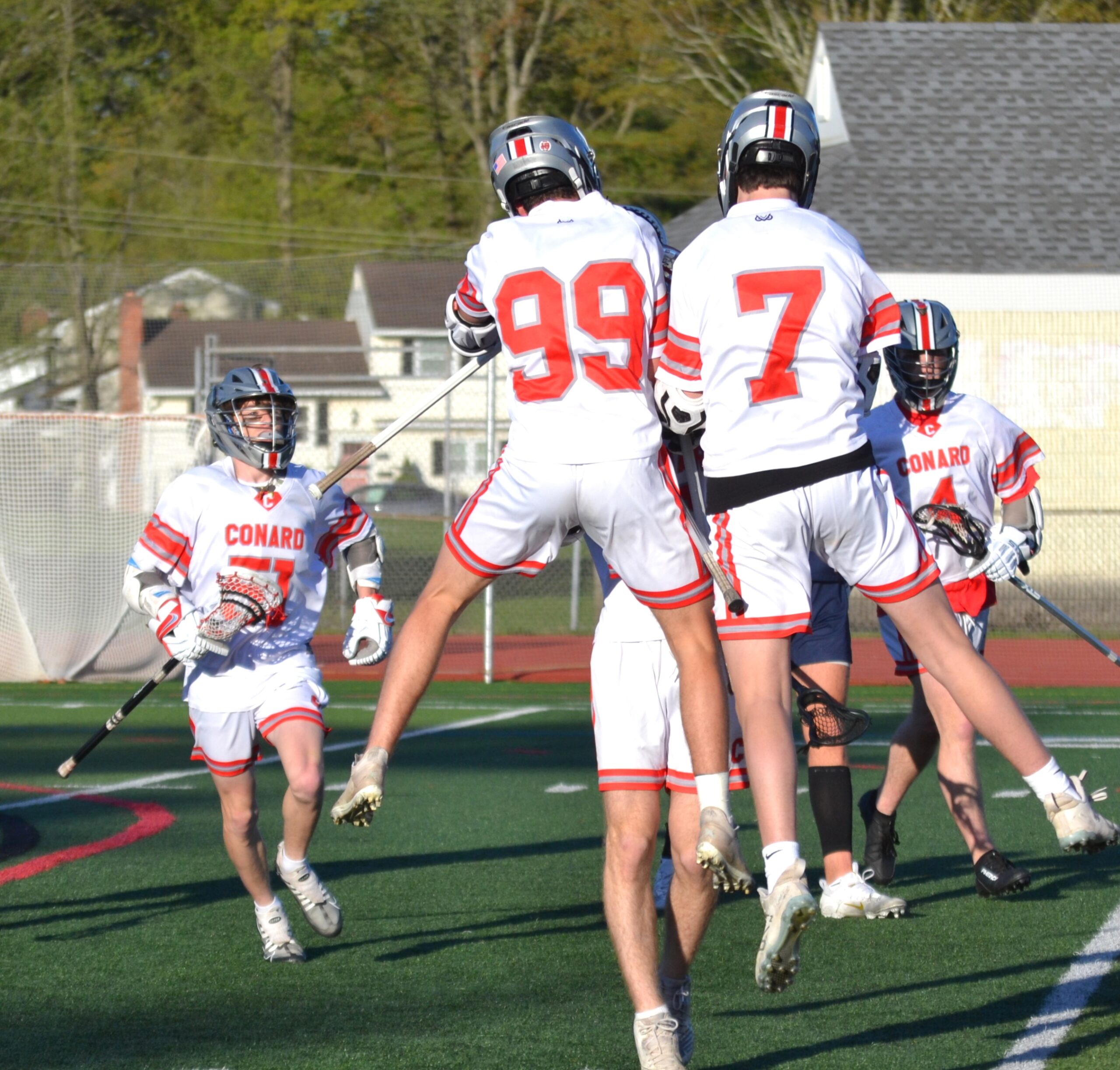 Luke Shaffer (99) and Torin McGoldrick (7) celebrate McGoldricks