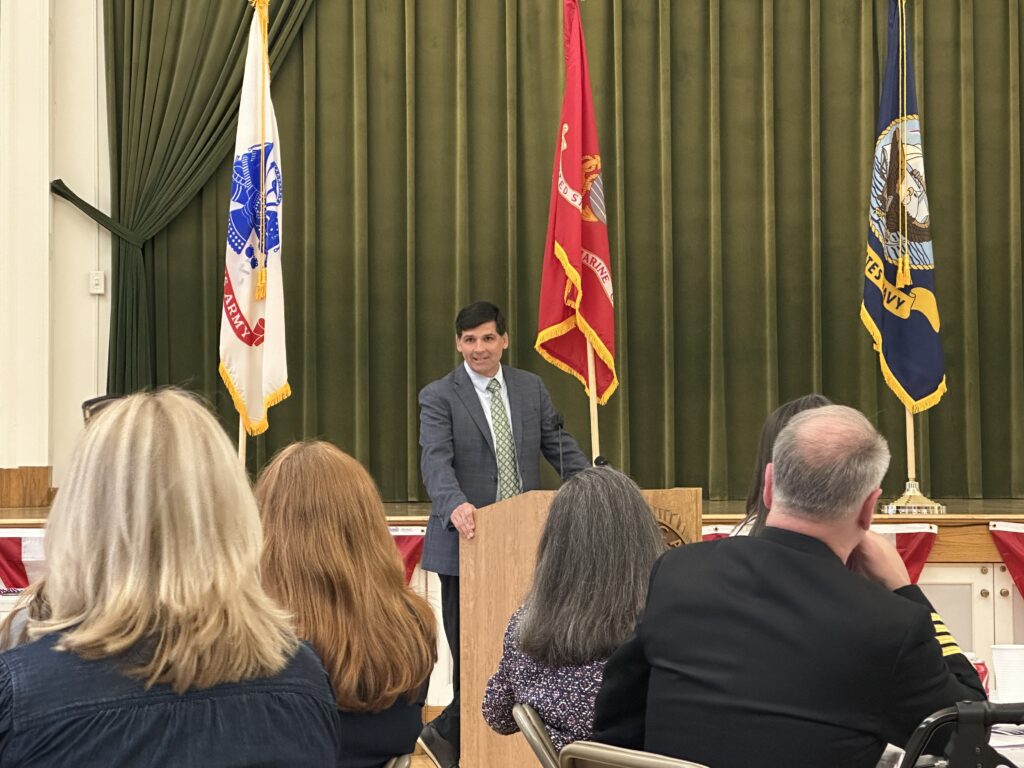 Conor Tracy gives his remarks at the ceremony. Photo credit: Roz Green